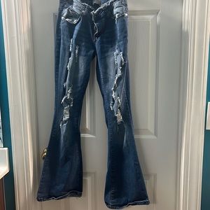 Medium Wash Low Rise Ripped Flare Jeans